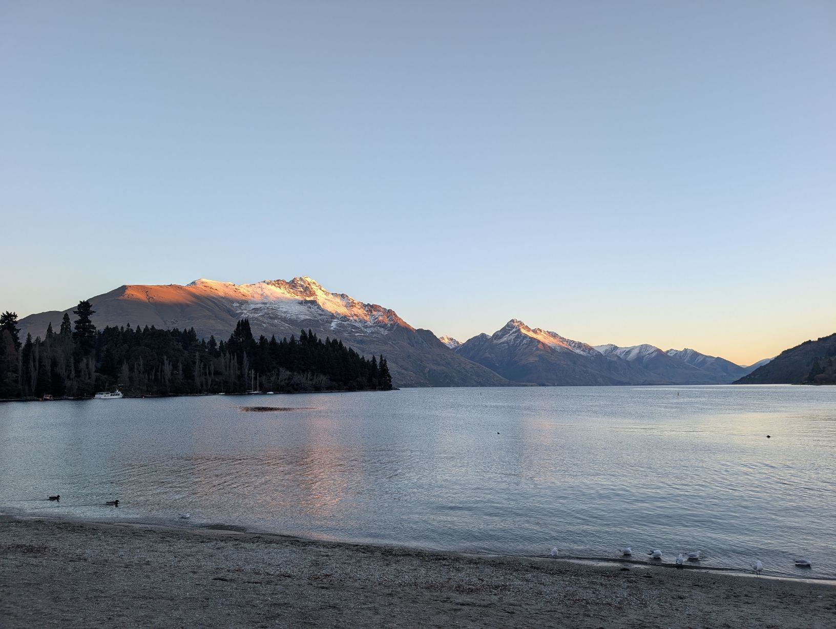 Queenstown beach and Lake Wakatipu at sunset